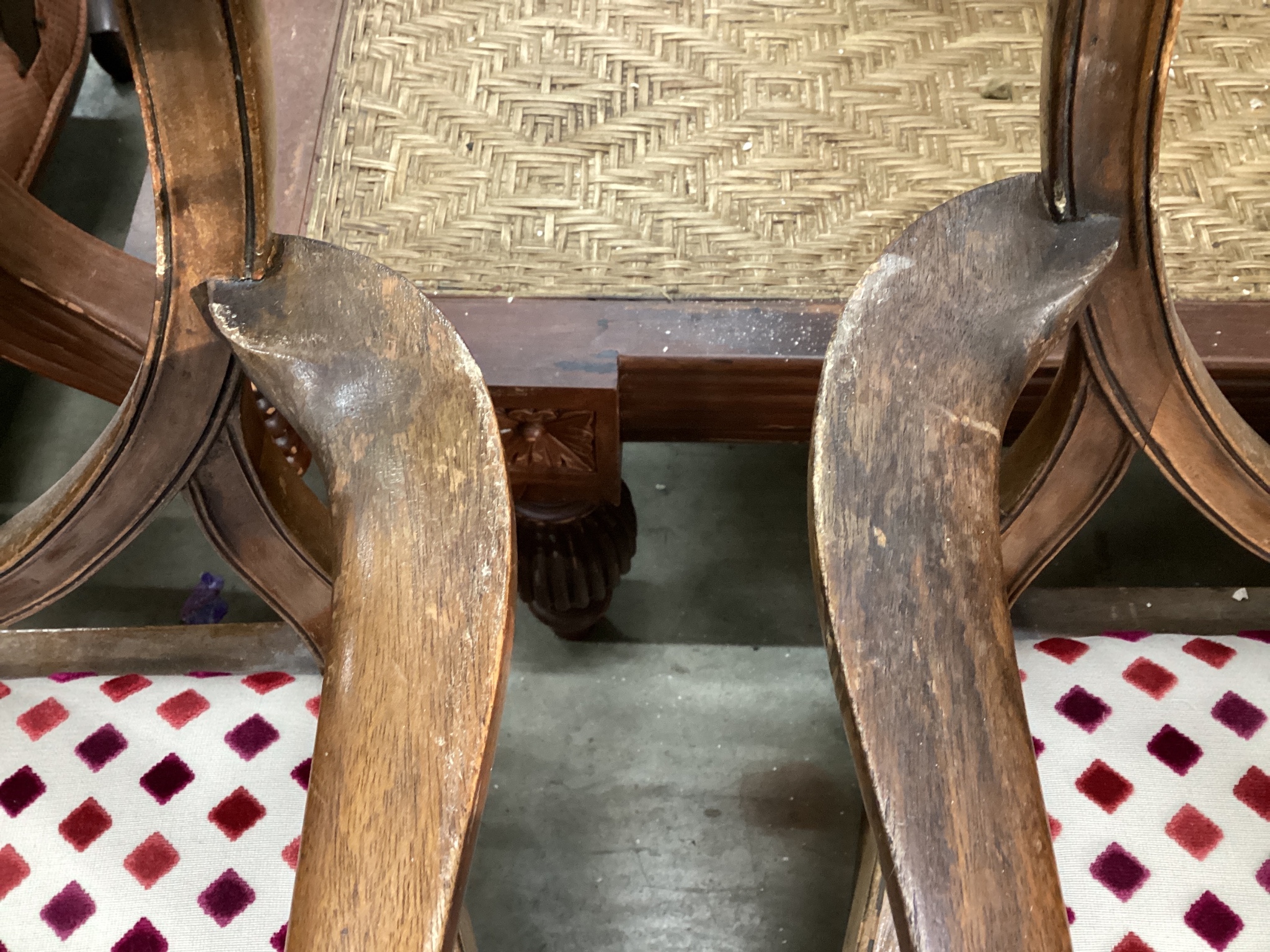 A set of eight Hepplewhite style mahogany dining chairs, two with arms